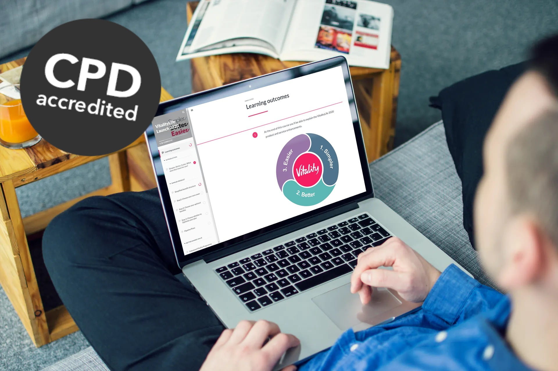 Man using Vitality Academy on laptop