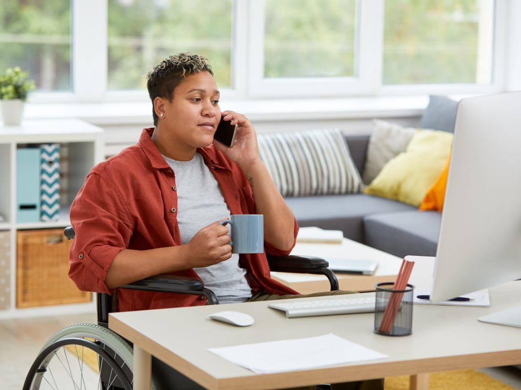 Person in wheelchair on the phone