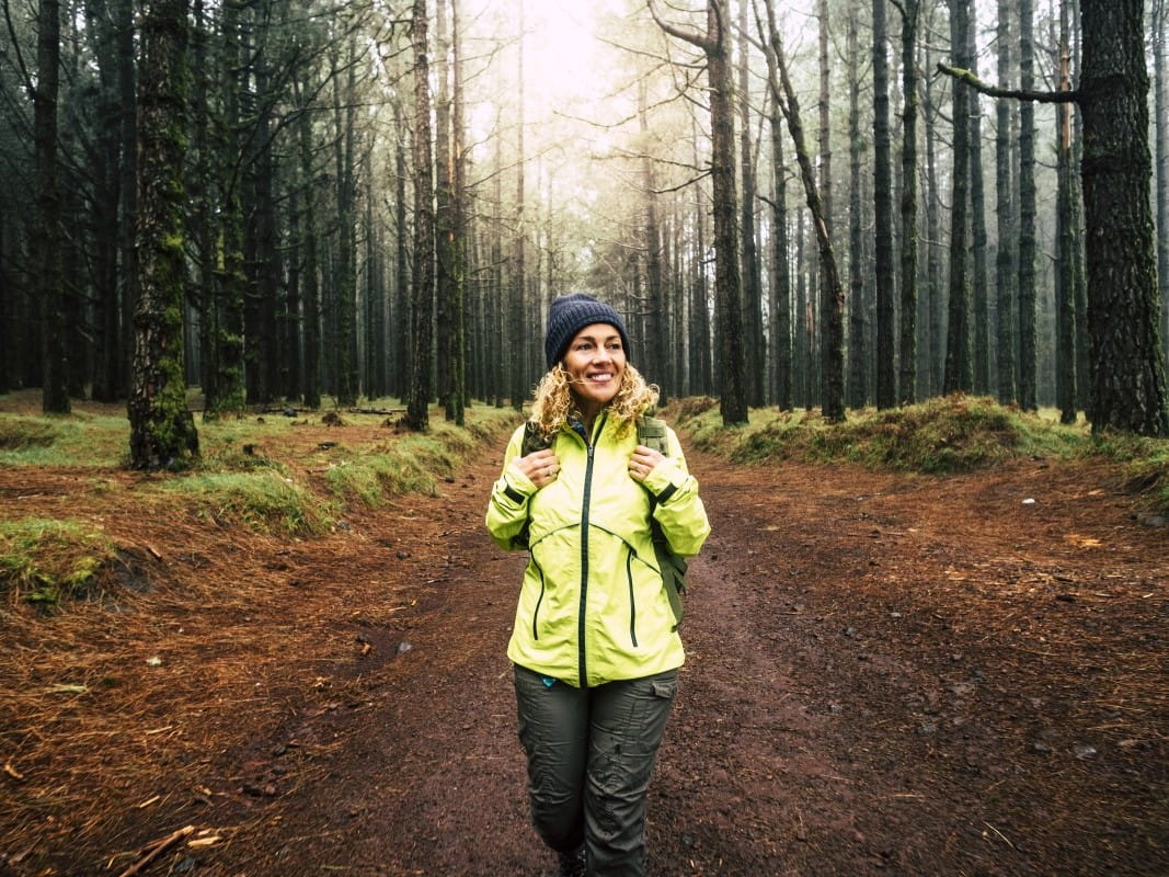 Woman walking in woods