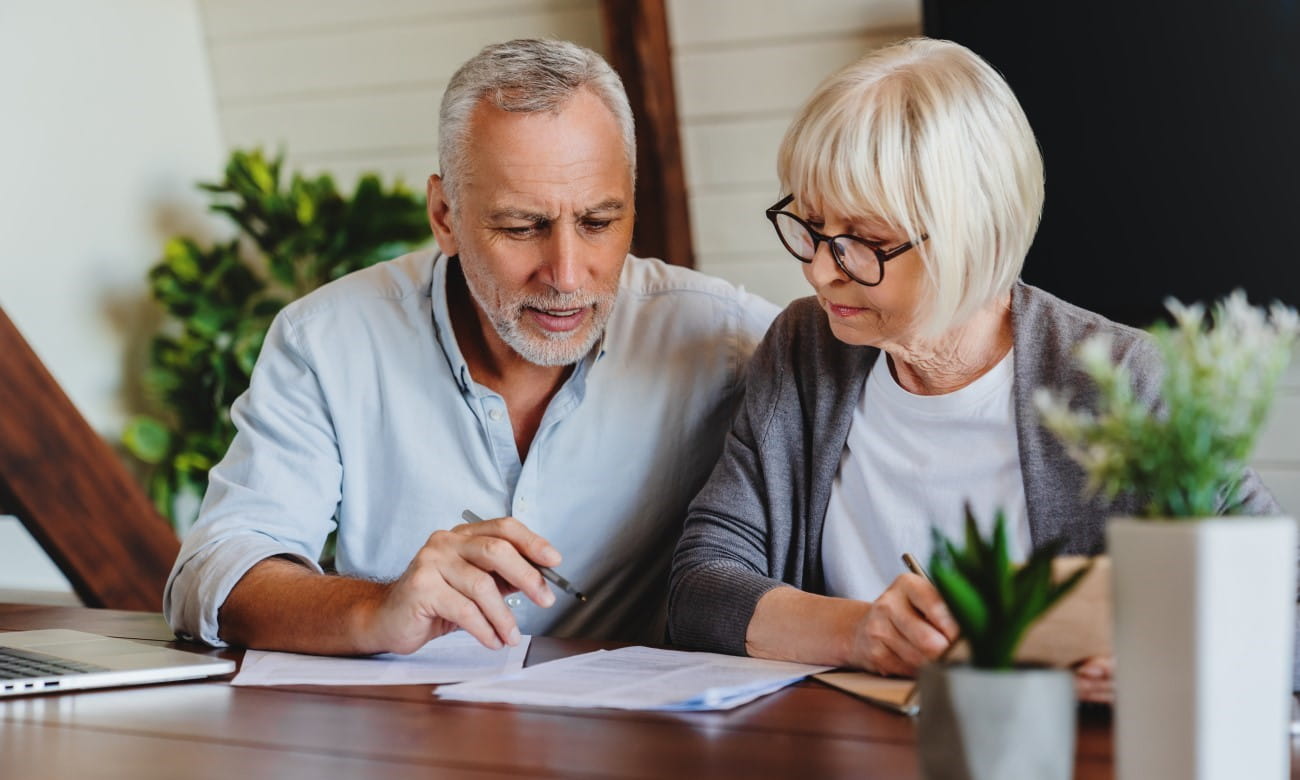 Elderly couple discussing