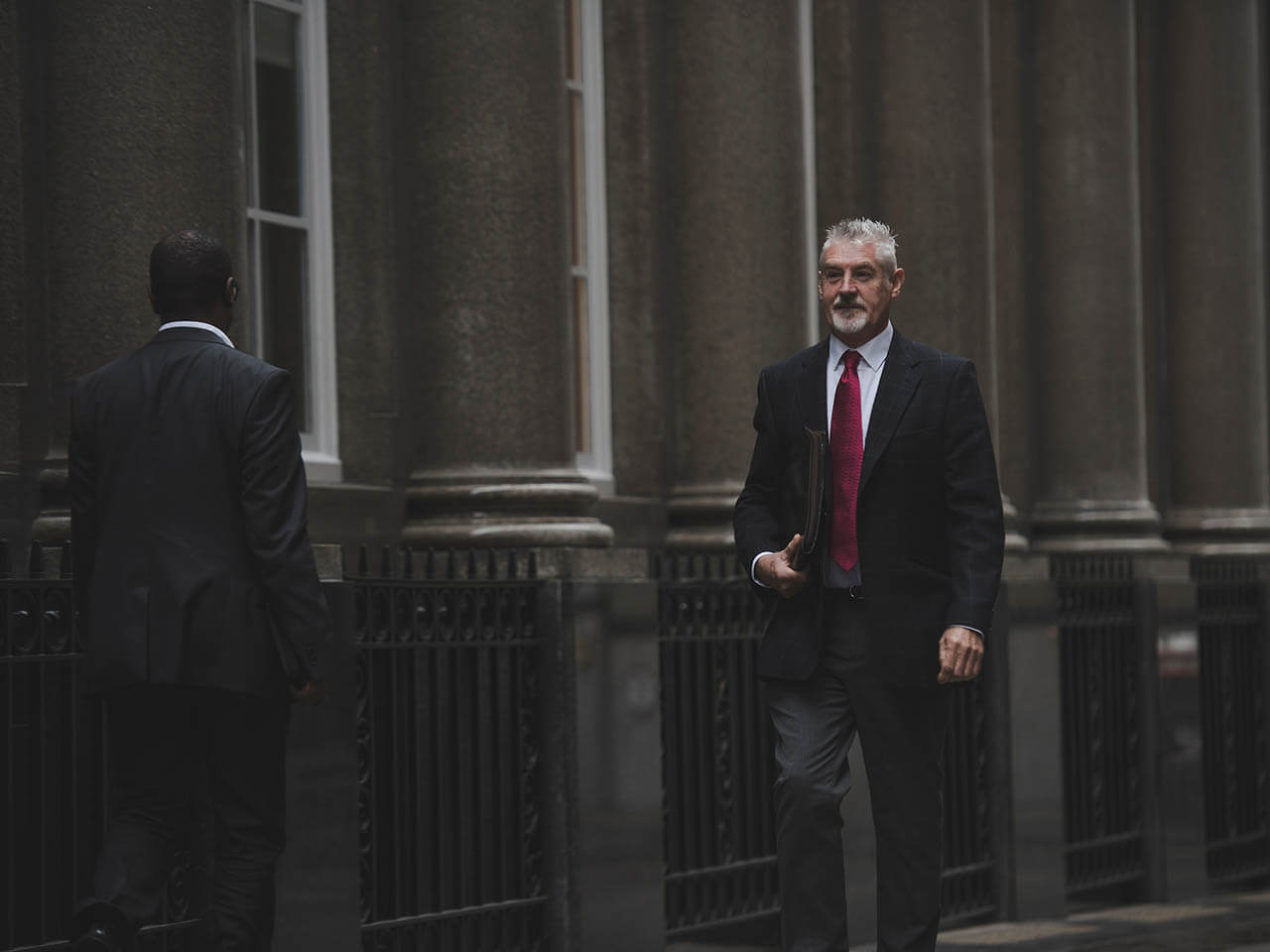 business man walking in the city