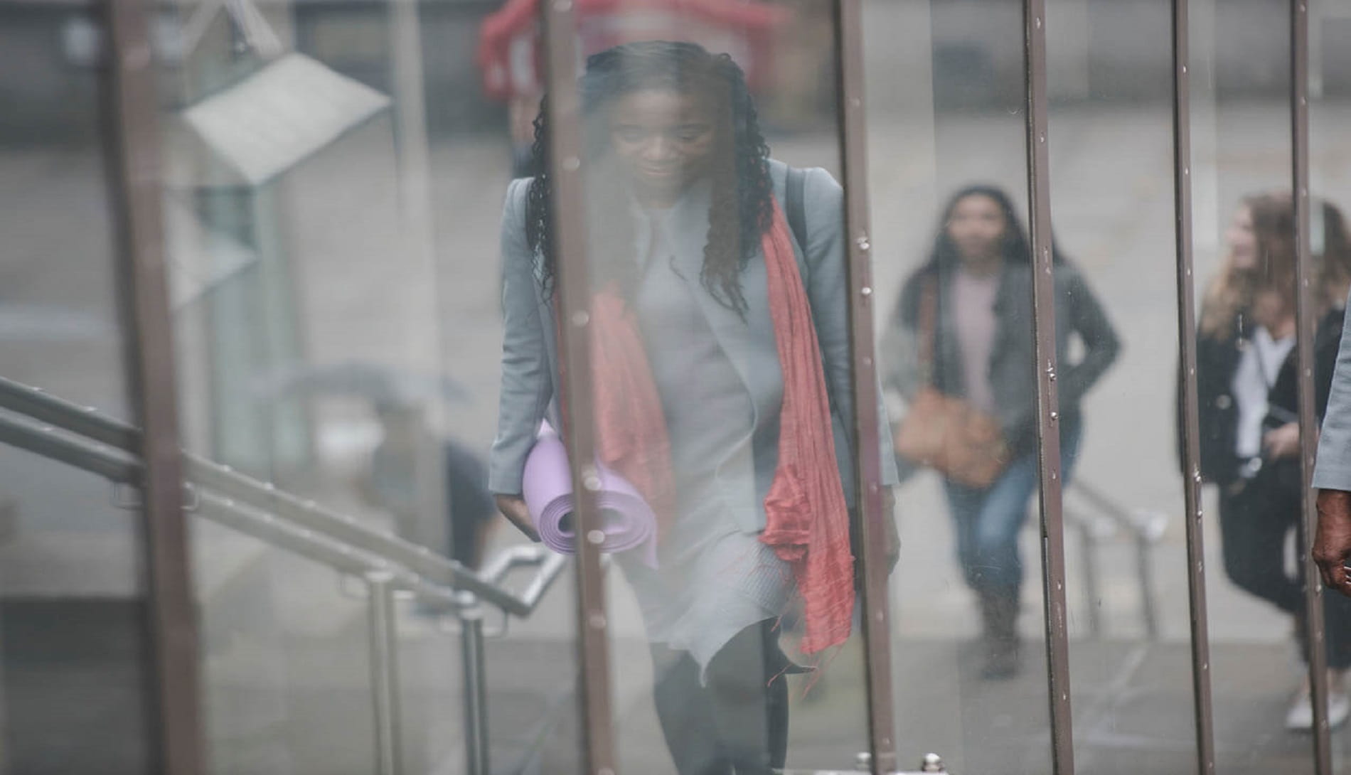 woman walking up stairs