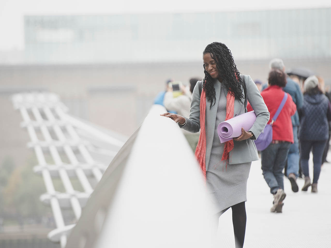 business women walking bridge