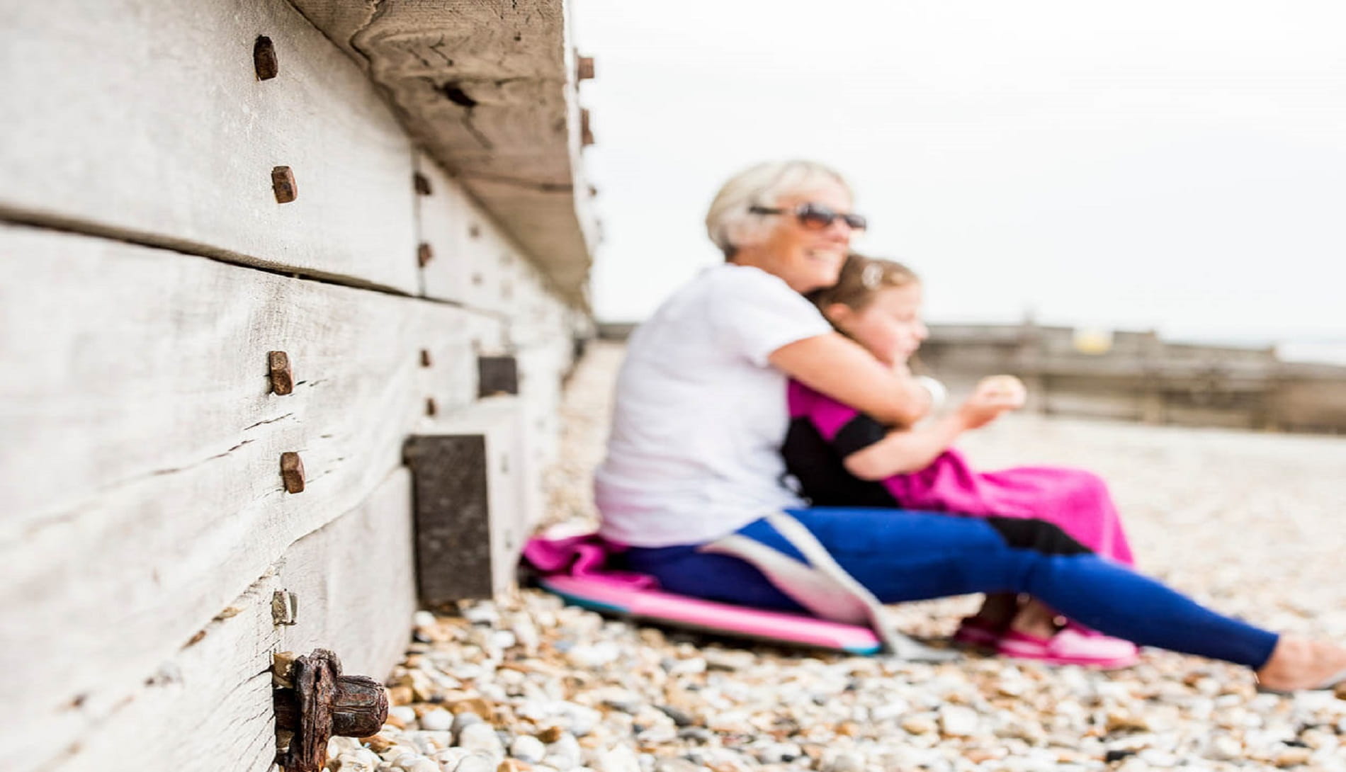 woman and child on beach
