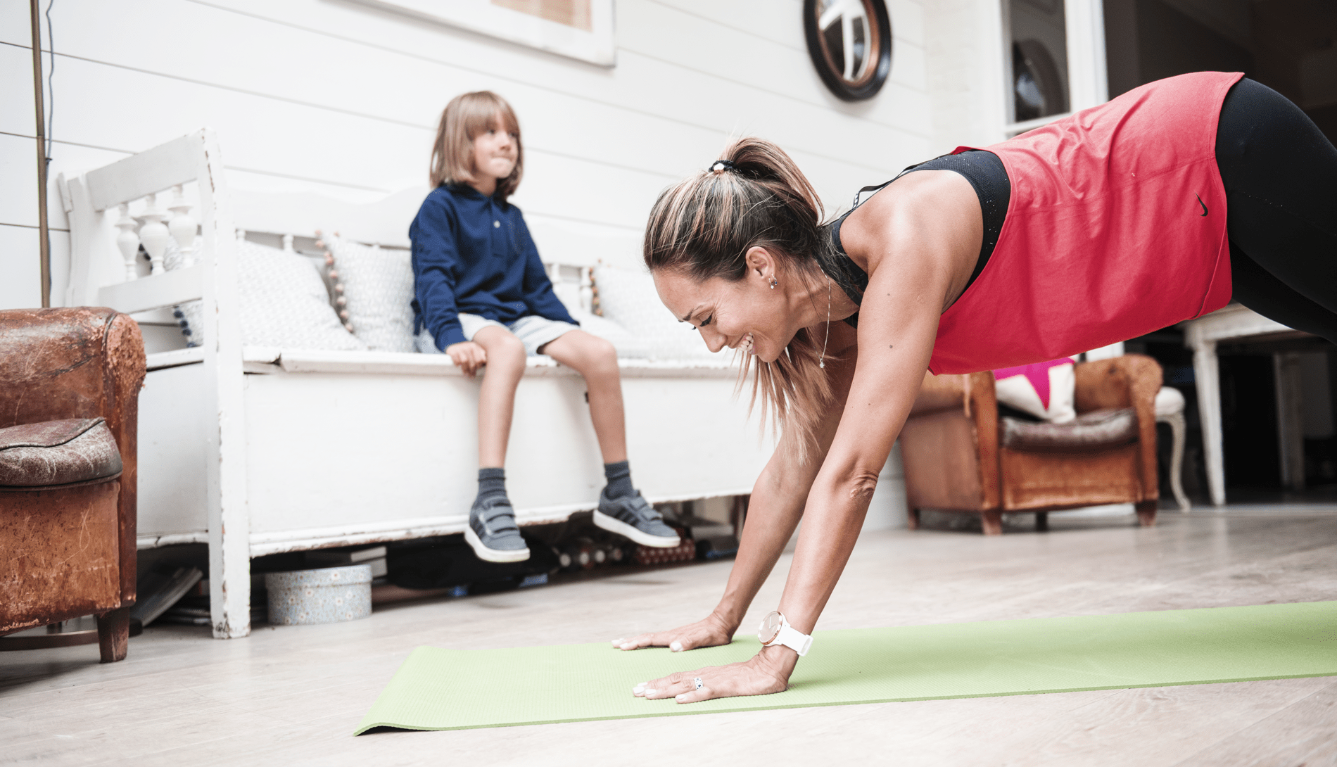 Woman doing exercise on mat