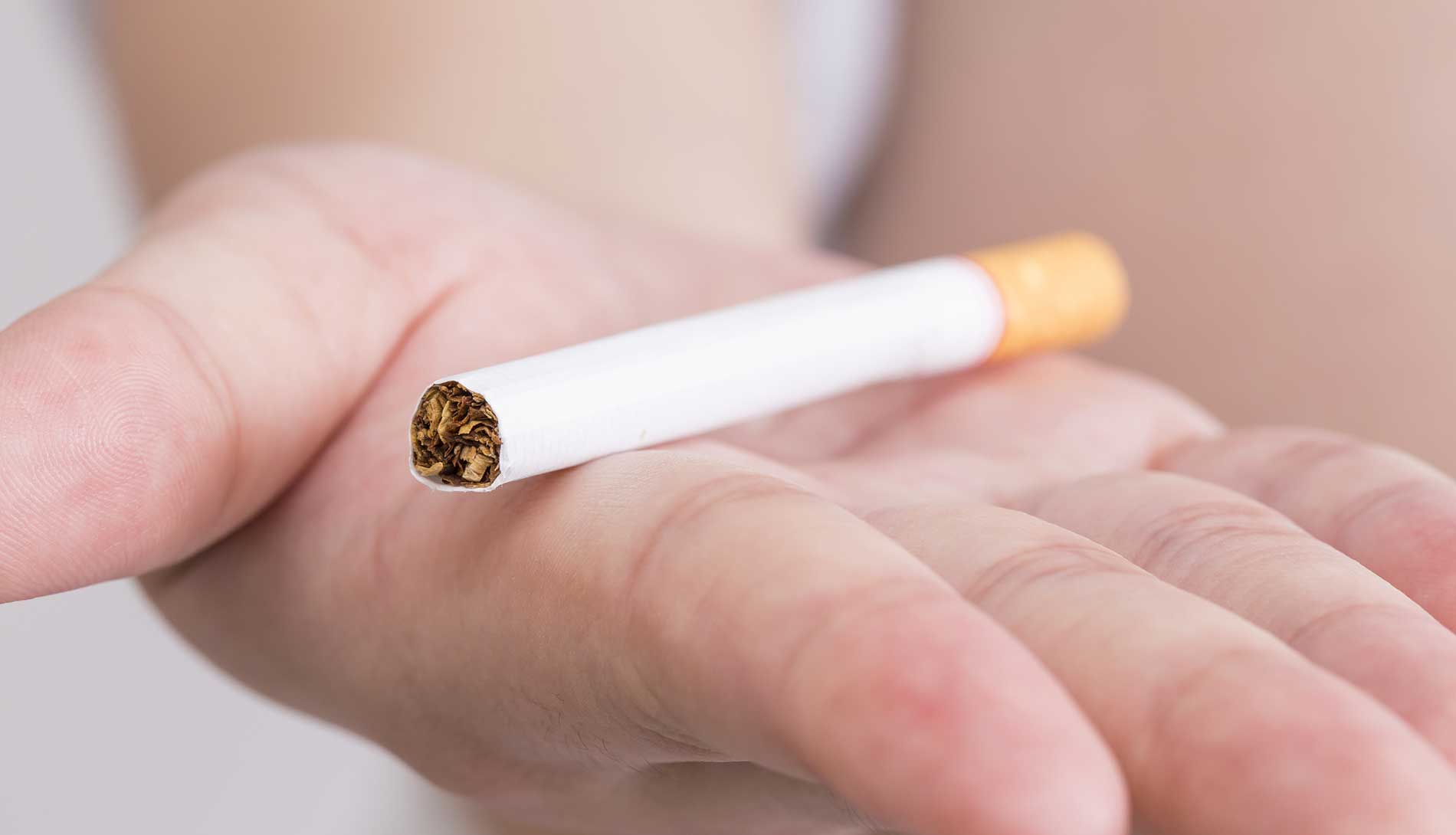 Hand holding cigarette