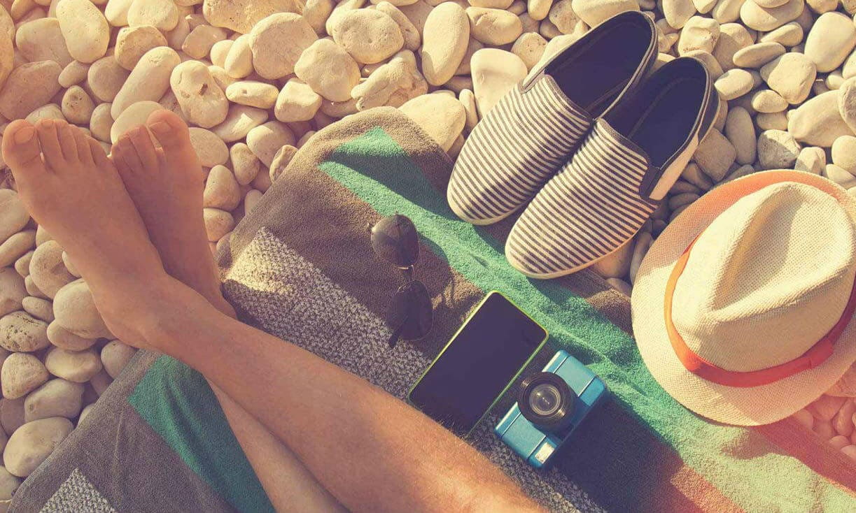 Person relaxing on a beach