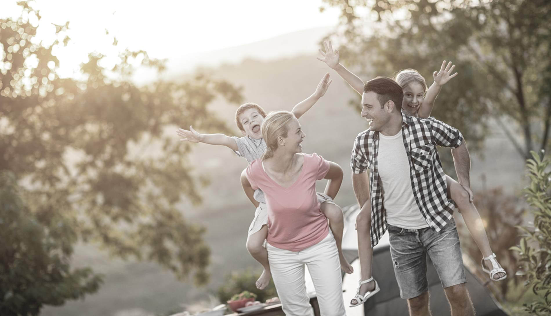 family walking outside smiling