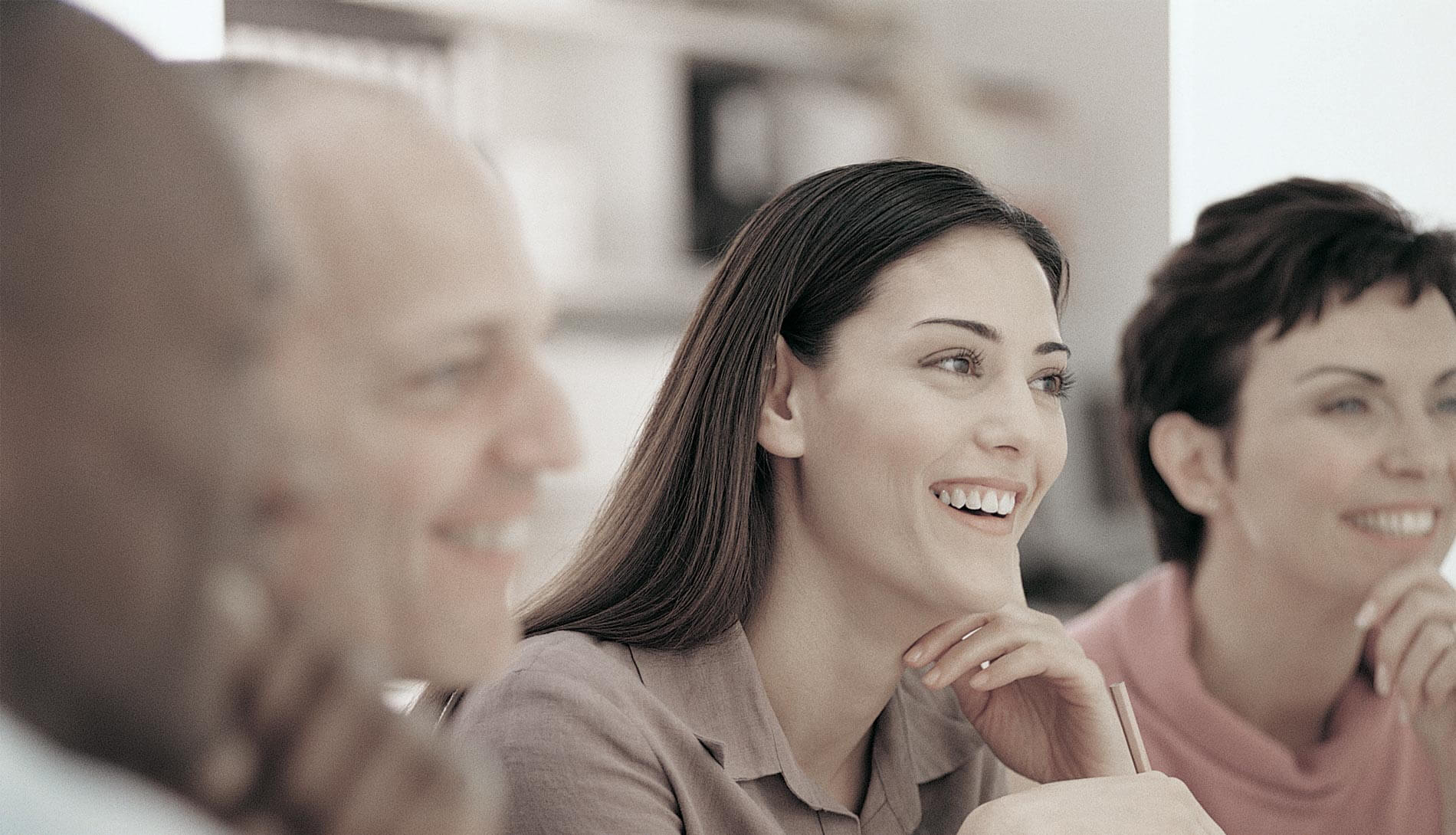 Professionals smiling and listening