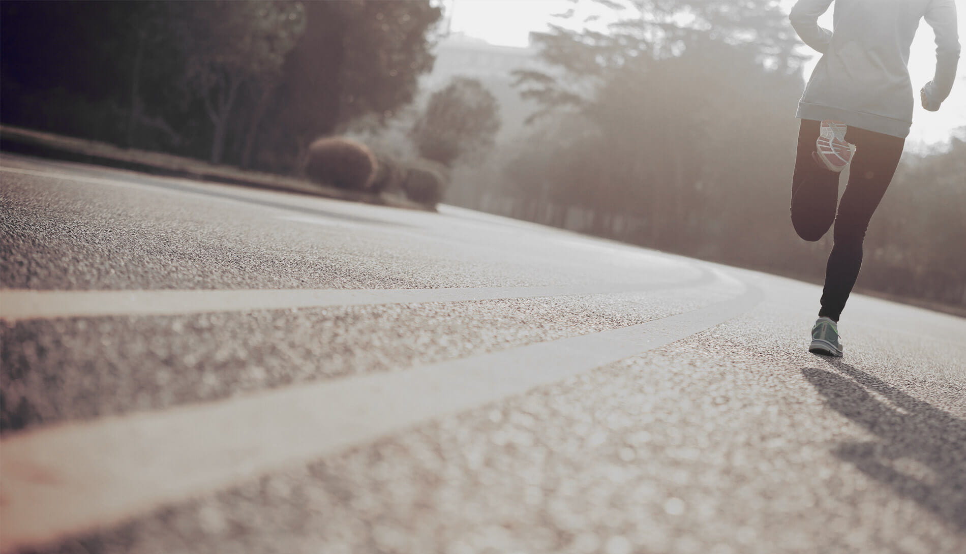 Female running along road