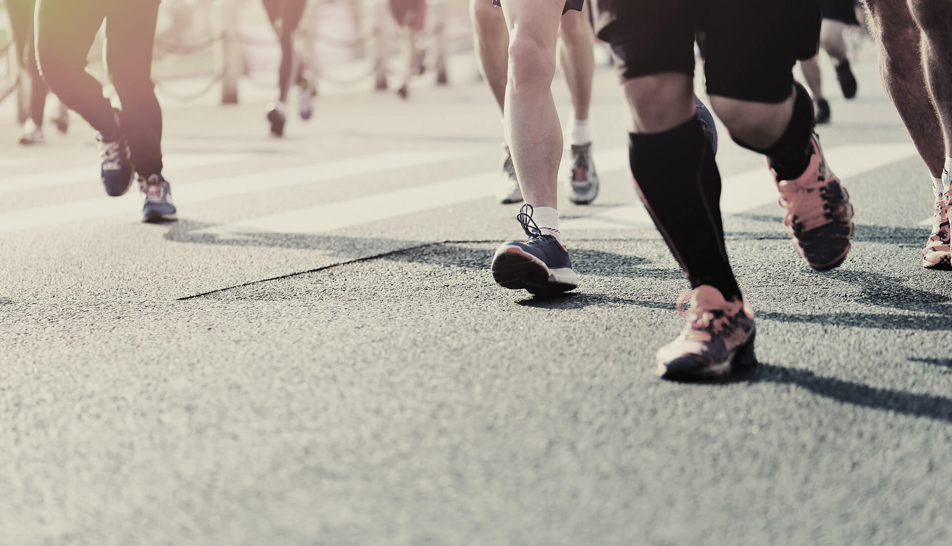 Close-up of running feet