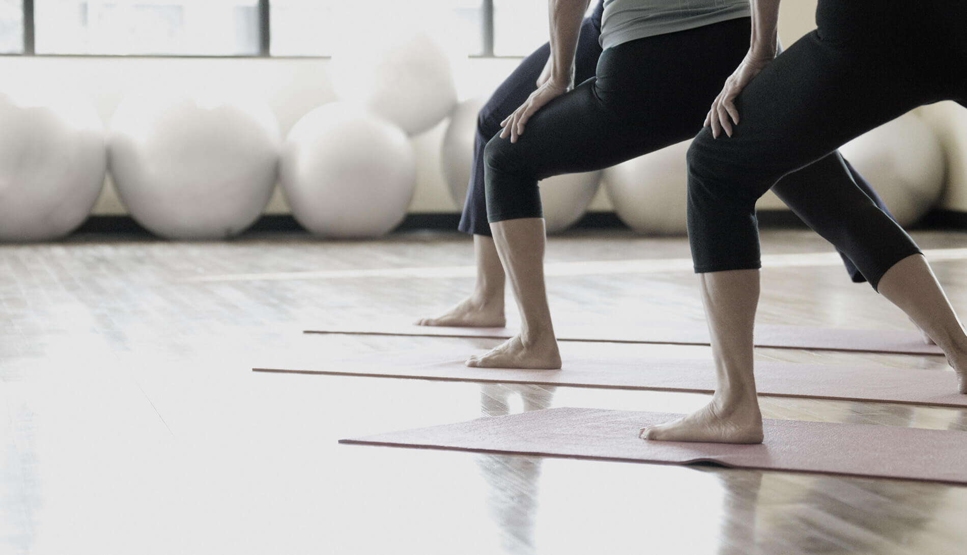 Stretching on yoga mats