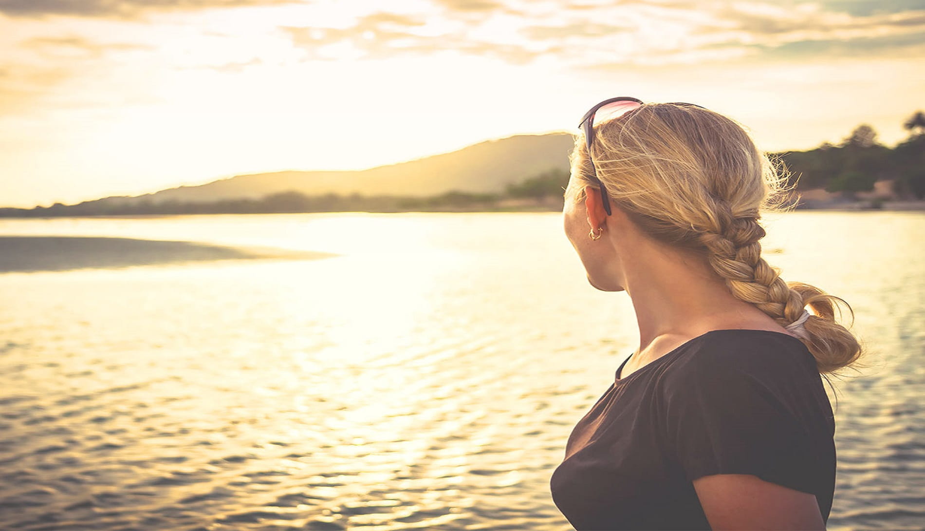 Woman looking over water