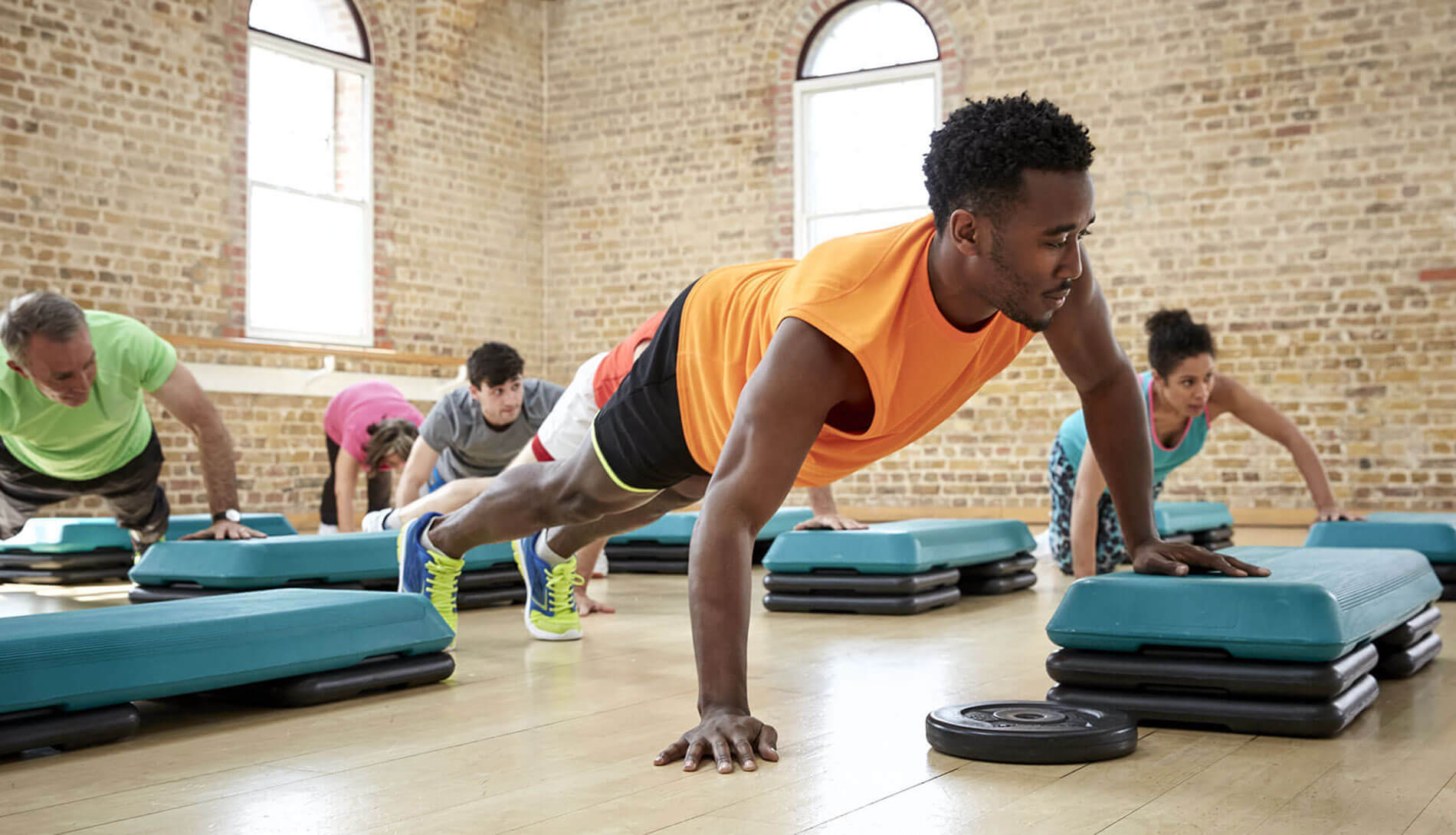 Man in gym doing pushups